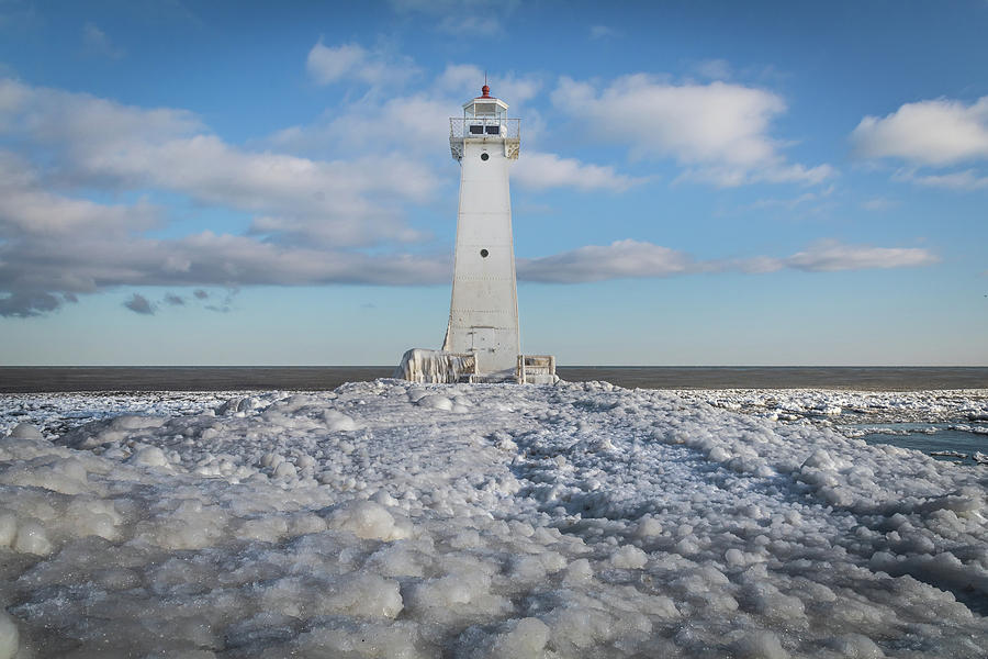 Winter lighthouse Photograph by Sandy Roe