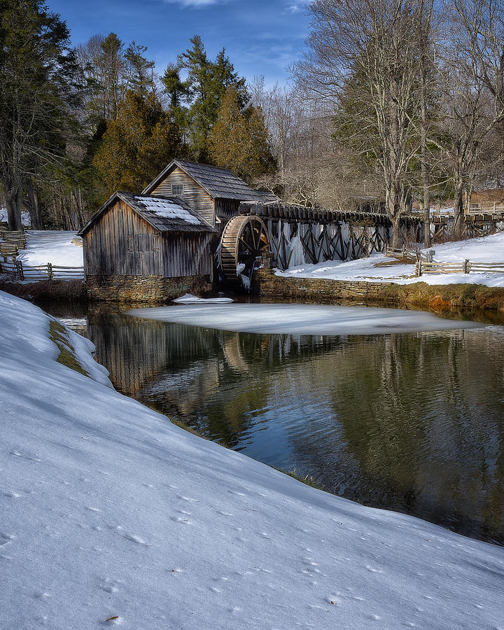 Winter snow at Mabry Mill Photograph by Steve Hurt