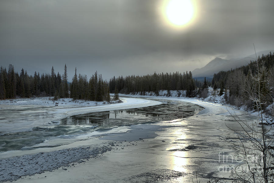 Winter Sun Reflections Over The Athabasca Photograph by Adam Jewell