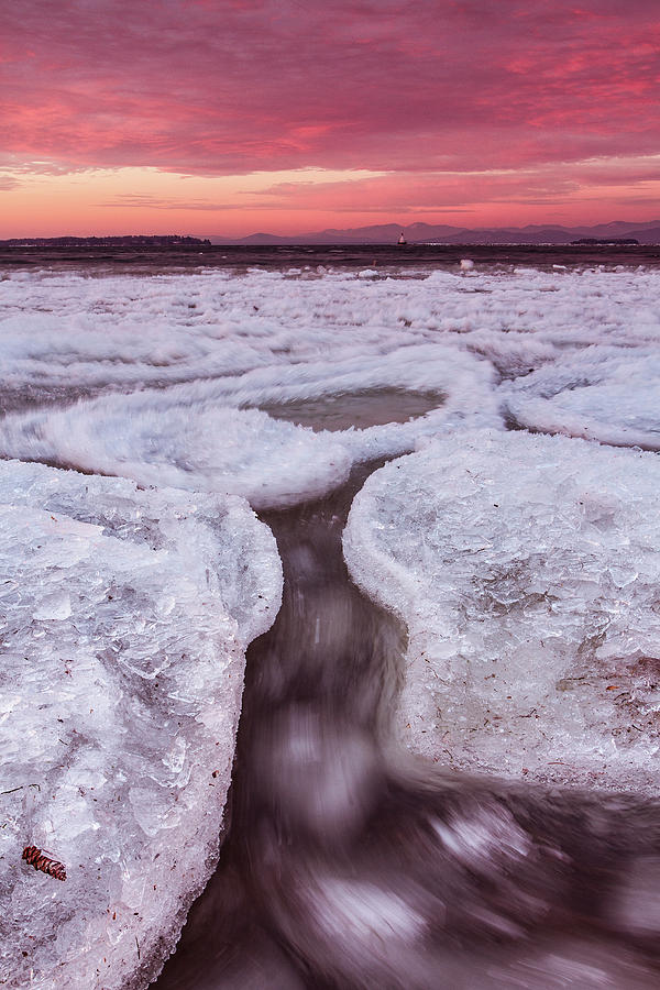 Winter Sunrise Over Lake Champlain With Ice And Water Motion Photograph