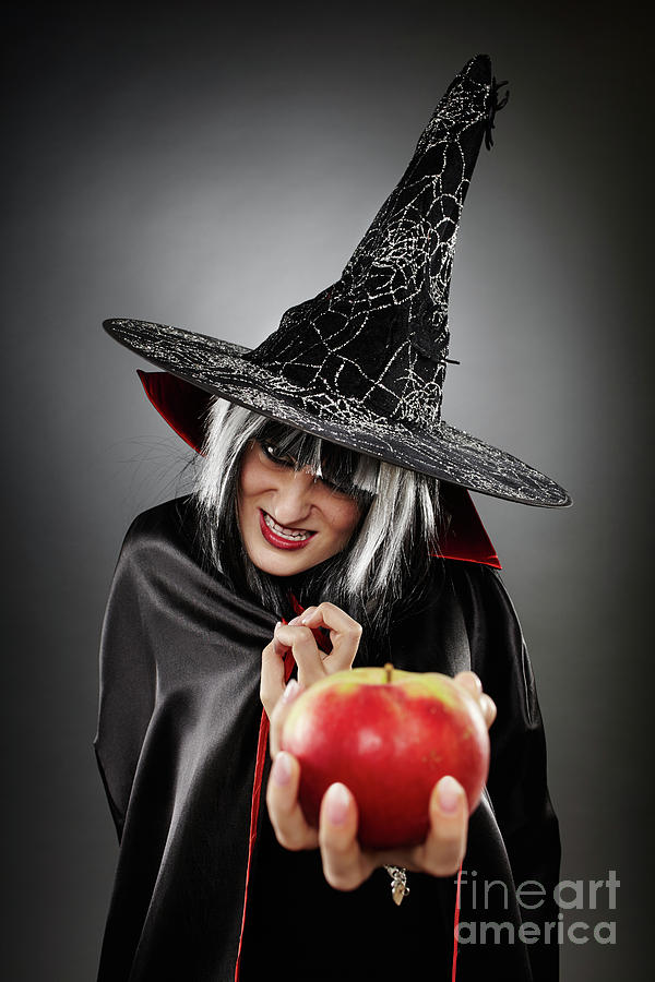 Witch offering a poisoned apple Photograph by Ragnar Lothbrok