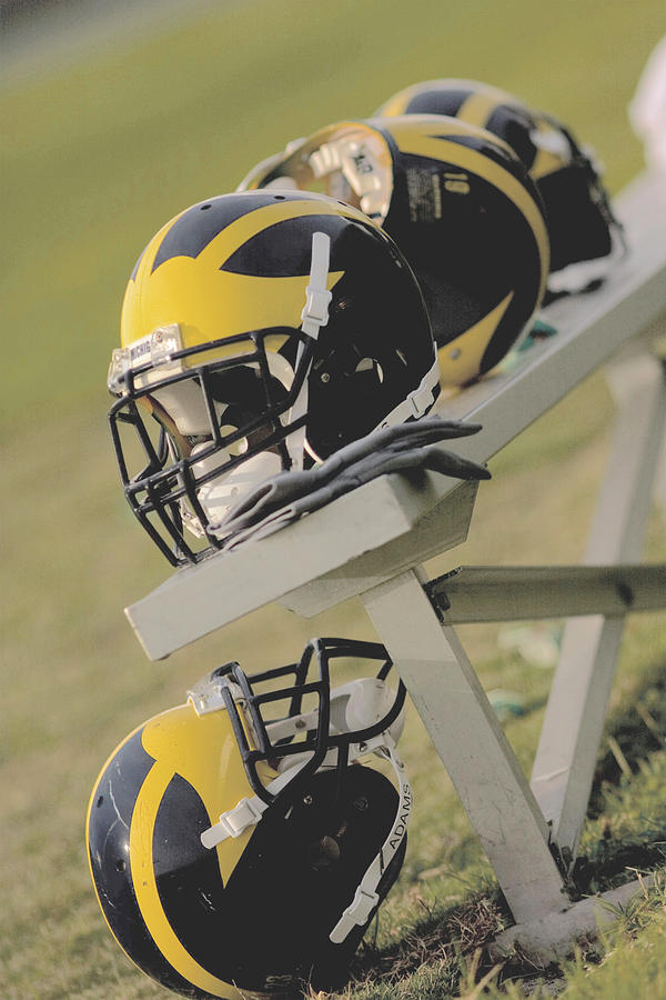 Wolverine Helmets On A Football Bench Photograph By Michigan Helmet