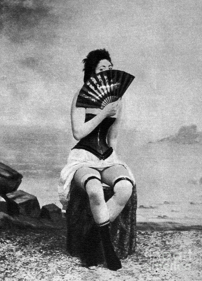 WOMAN AND FAN, c1887 Photograph by Granger