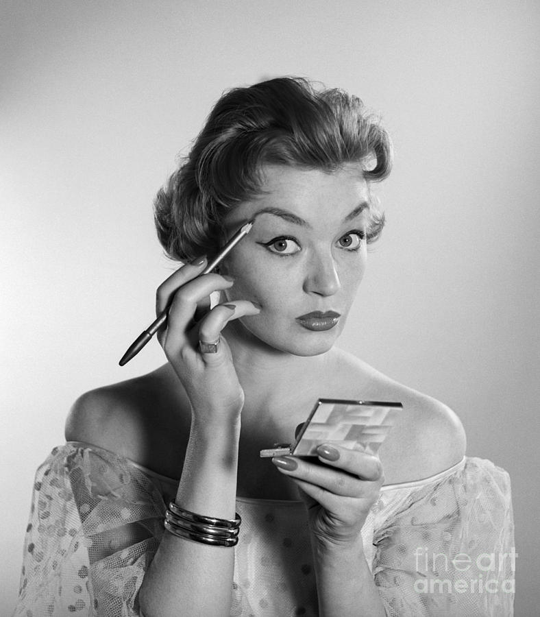 Woman Applying Makeup, C.1950-60s Photograph by Corry/ClassicStock