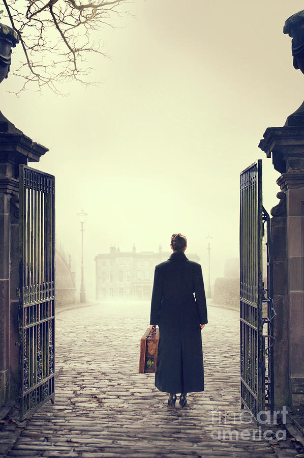 Woman Arriving At The Gates Of A Mansion  Photograph by Lee Avison