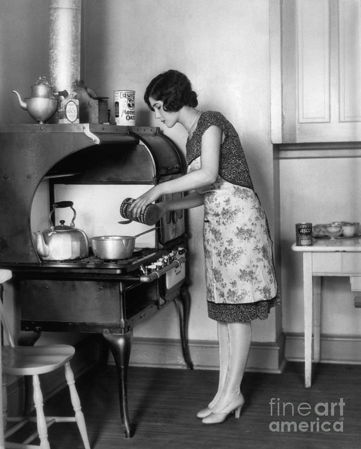 Woman At Stove Cooking, C.1920s Photograph by H. Armstrong Roberts/ClassicStock