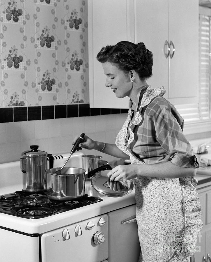 Woman Cooking On Stovetop, C.1950s Photograph by H. Armstrong Roberts/ClassicStock