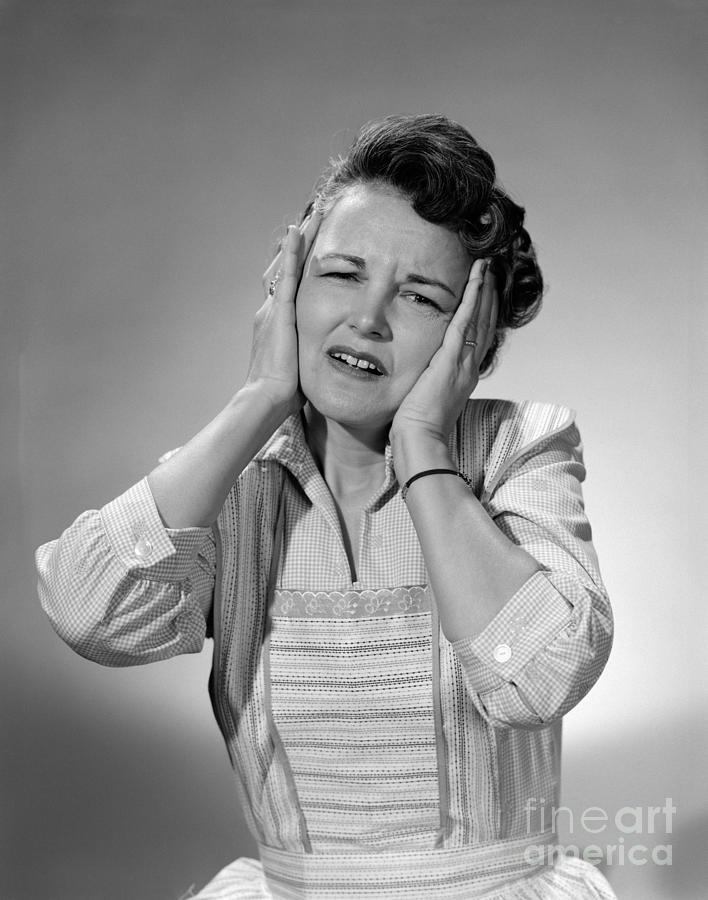 Woman Covering Her Ears Photograph by H. Armstrong Roberts/ClassicStock