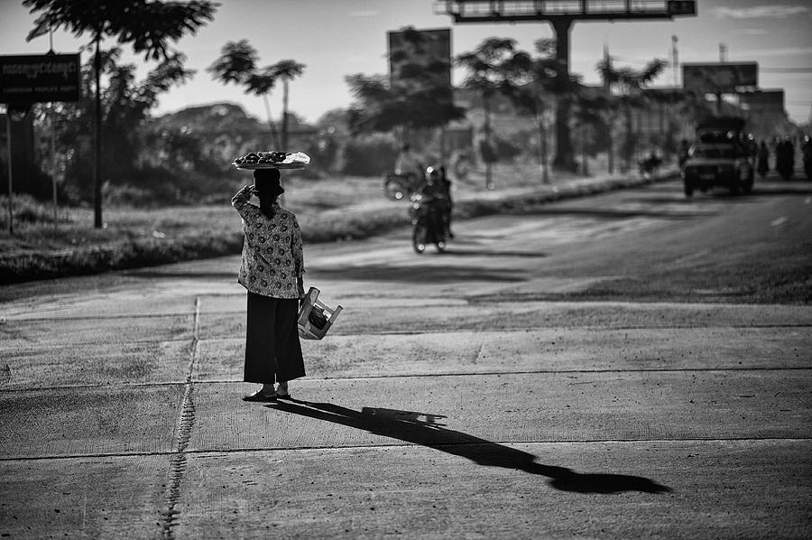 Woman Crossing Road Photograph by Bo Nielsen