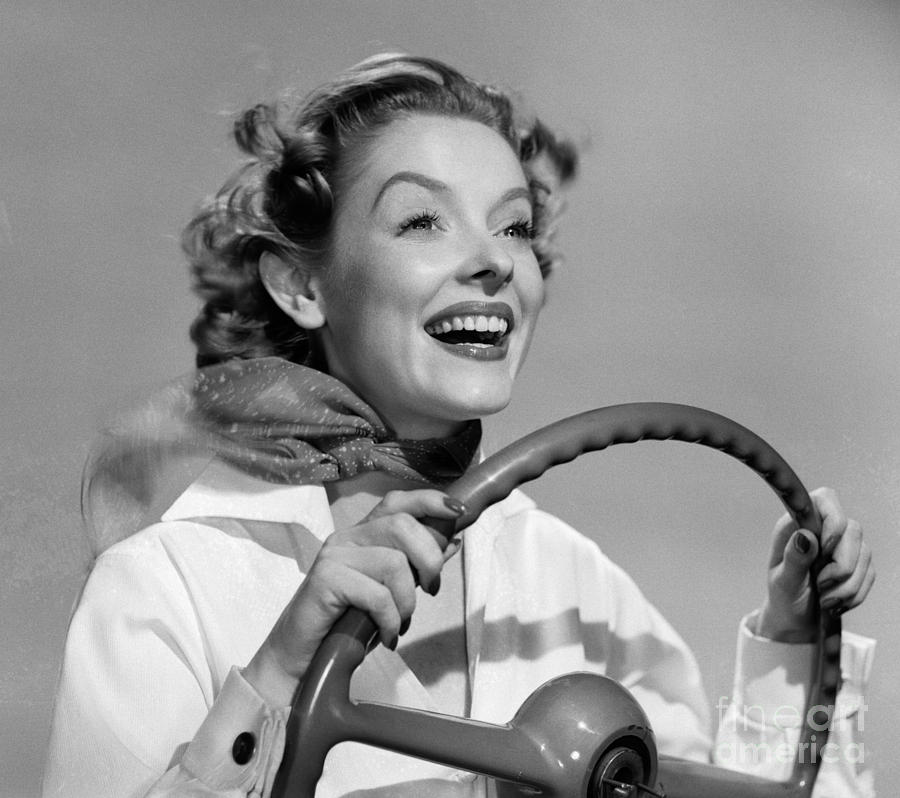 Woman Driving And Smiling, C.1950s Photograph by Debrocke/ClassicStock