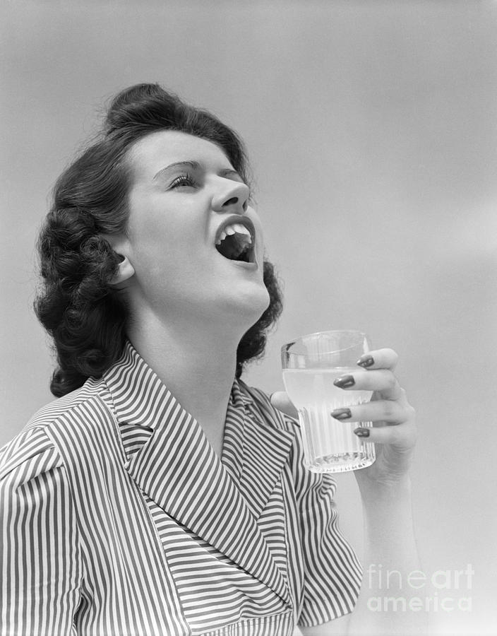 Woman Gargling Photograph by H. Armstrong Roberts/ClassicStock