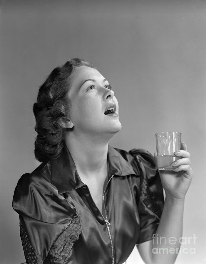 Woman Gargling Water Photograph by H. Armstrong Roberts/ClassicStock