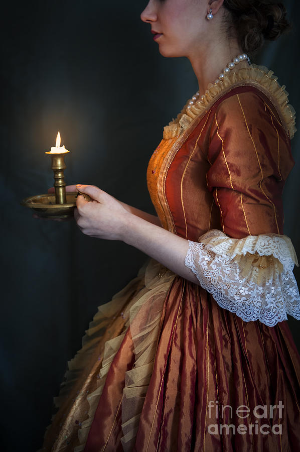 Woman In 18th Century Georgian Dress Holding A Candle Photograph by Lee Avison