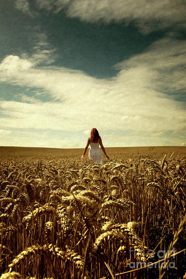 Woman in corn field Photograph by Clayton Bastiani