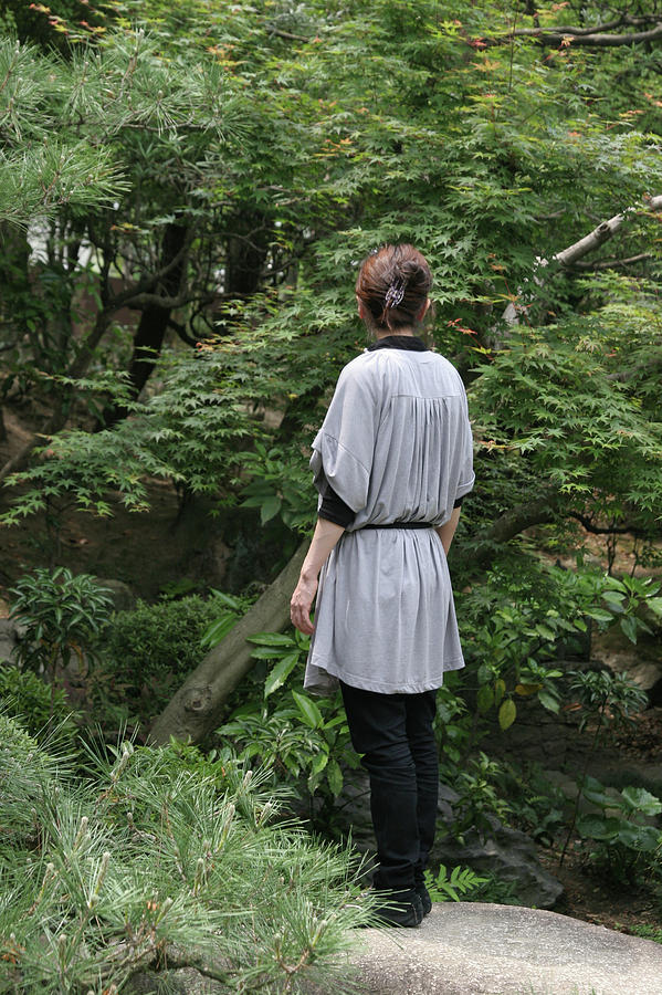 woman in Japanese garden Photograph by Masami Iida