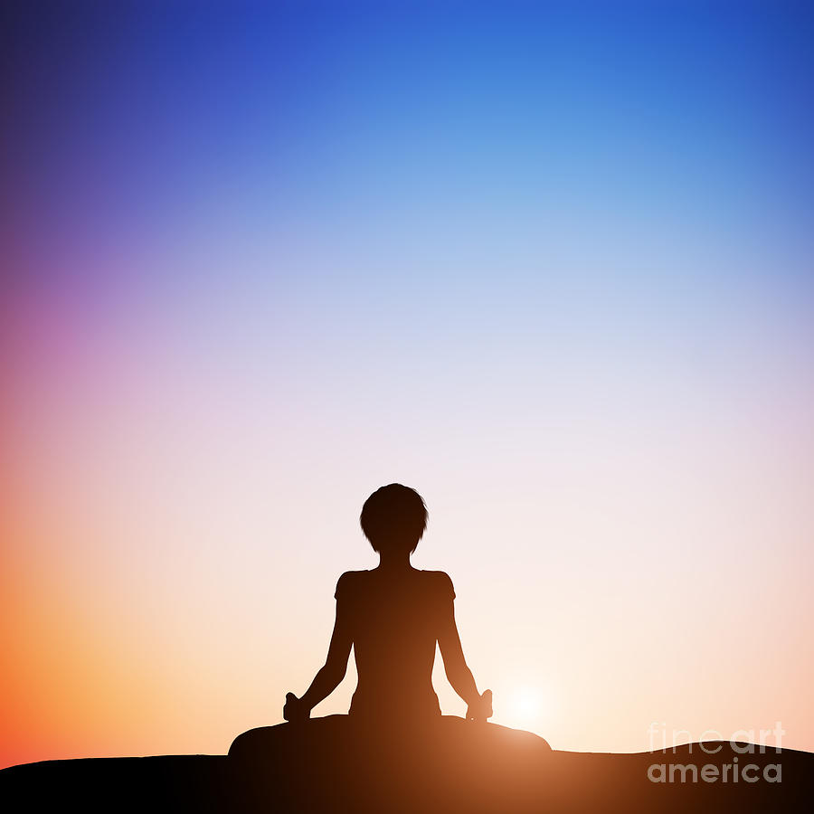 Woman in lotus yoga pose meditating at sunset Photograph by Michal Bednarek