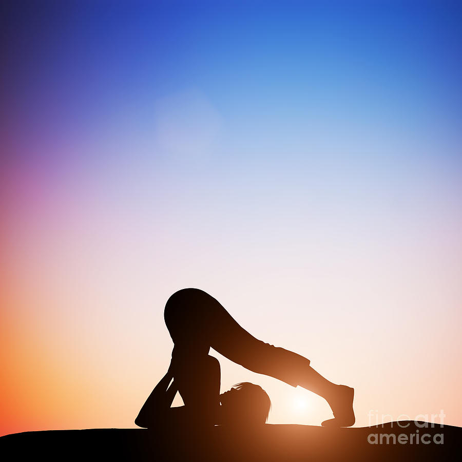 Woman in plow yoga pose meditating at sunset Photograph by Michal Bednarek