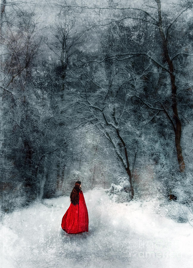 Woman in Red Cape Walking in Snowy Woods Photograph by Jill Battaglia