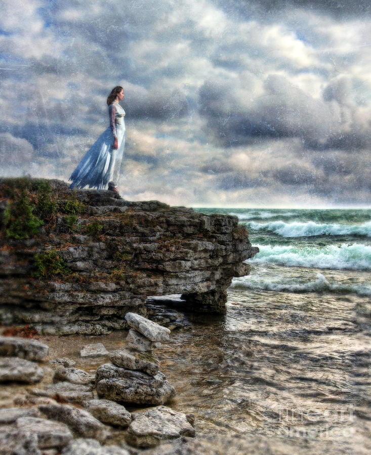 Vintage Photograph - Woman in Tattered Dress by the Stormy Sea by Jill Battaglia