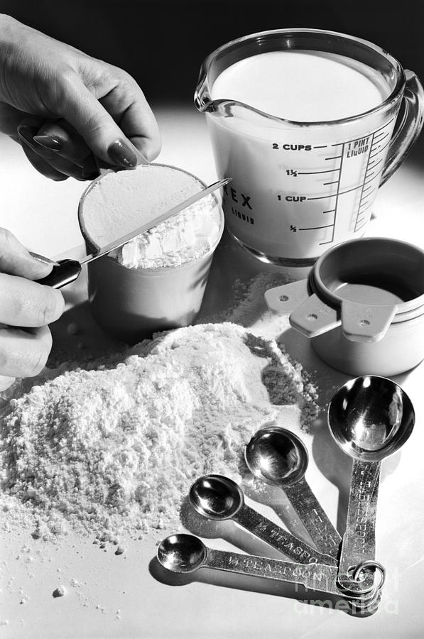 Woman Leveling Flour For Baking Photograph by H. Armstrong Roberts/ClassicStock