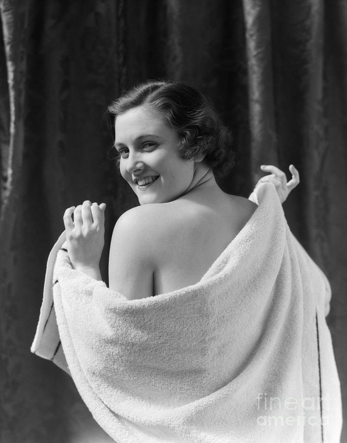 Woman Looking Over Shoulder In Towel Photograph by H. Armstrong Roberts/ClassicStock