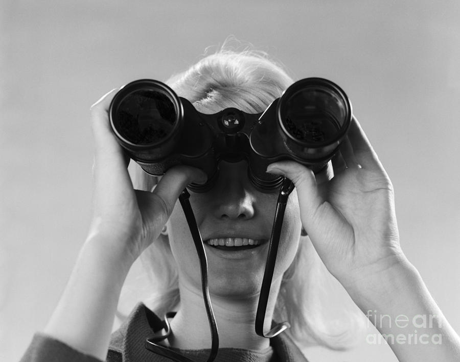 Woman Looking Through Binoculars Photograph by H. Armstrong Roberts/ClassicStock