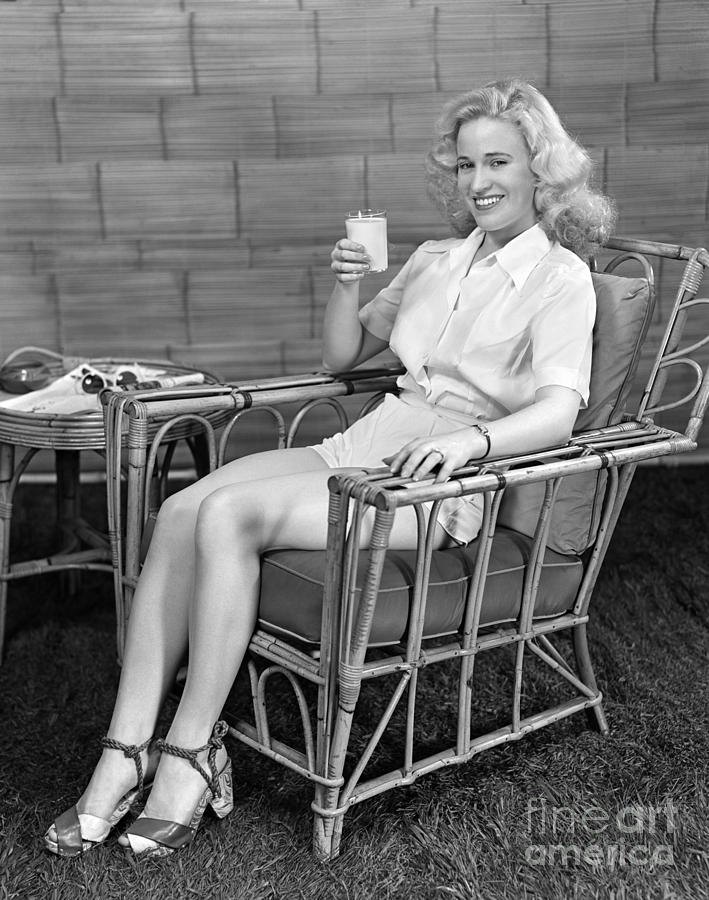 Woman Lounging With Milk, C.1940s Photograph by H. Armstrong Roberts/ClassicStock