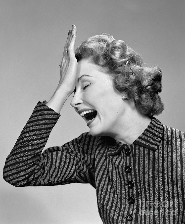 Woman Putting Palm To Forehead, C.1950s Photograph by Debrocke/ClassicStock