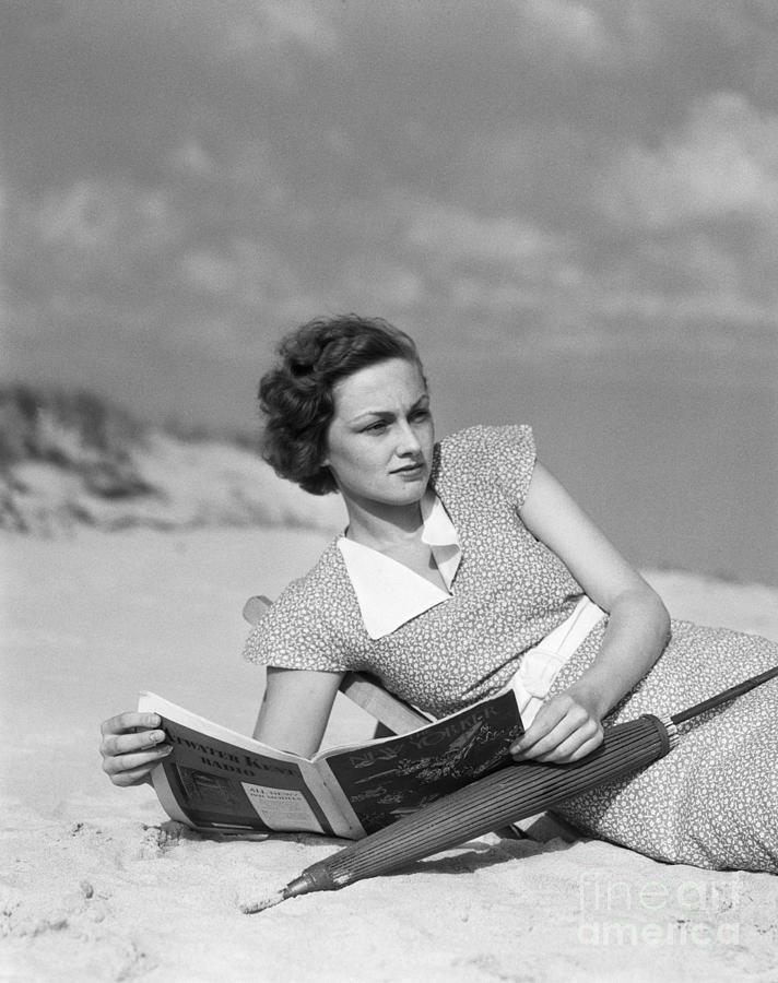 Woman Reading In Beach Chair, C.1930s Photograph by H. Armstrong Roberts/ClassicStock