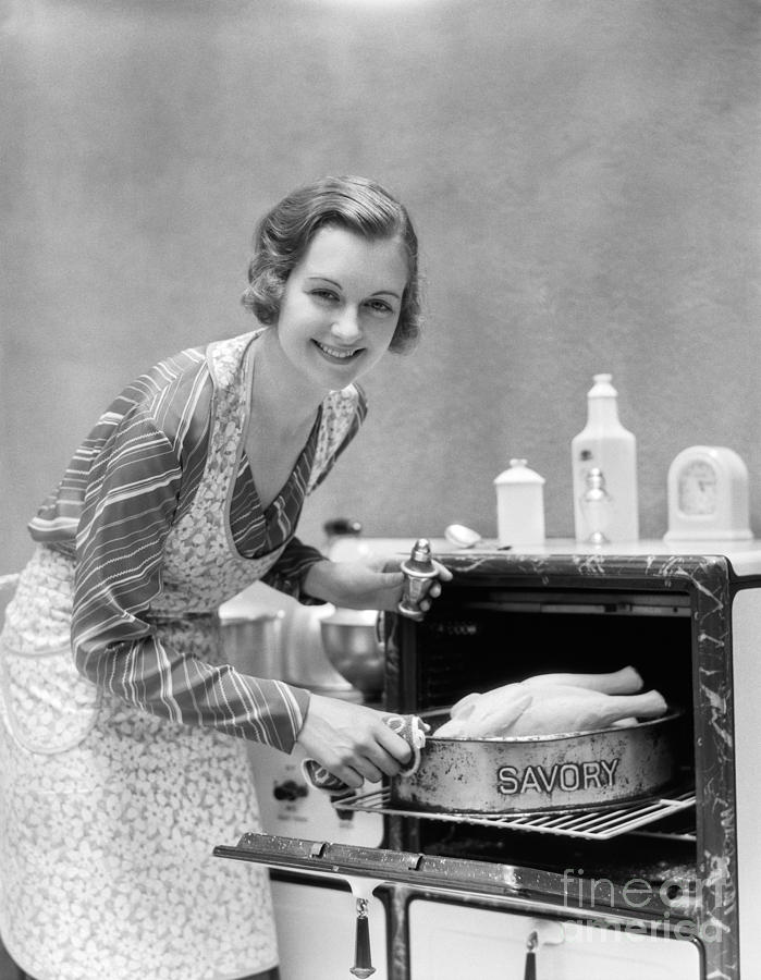 Woman Roasting Turkey, C.1930s Photograph by H. Armstrong Roberts/ClassicStock