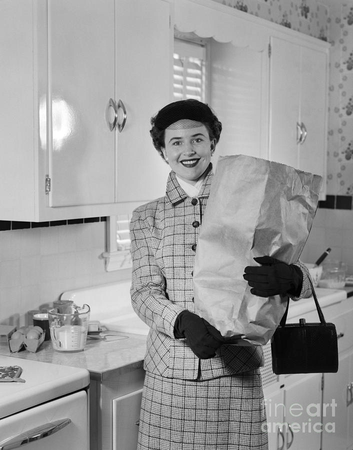Woman Smiling With Grocery Bag, C.1950s Photograph by H. Armstrong Roberts/ClassicStock