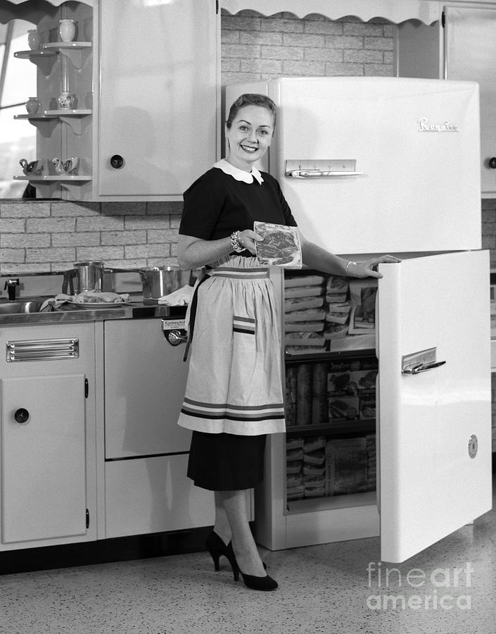 Woman Taking Food From Freezer, C.1950s Photograph by H. Armstrong Roberts/ClassicStock