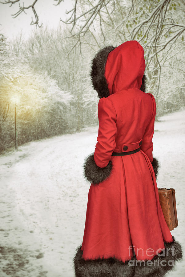 Woman In Red Coat Walking In Snow Photograph By Amanda Elwell Fine Art America