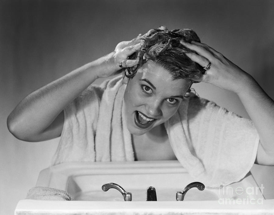 Woman Washing Hair In Sink, 1950s Photograph by Debrocke/ClassicStock