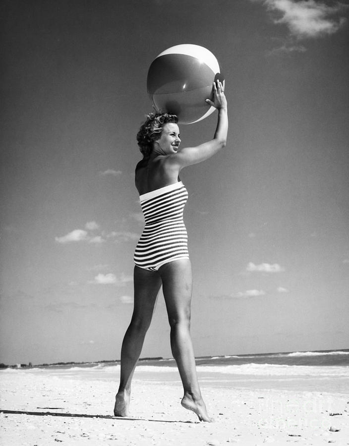 Woman With Beach Ball, C.1960s Photograph by H Armstrong Roberts and ClassicStock
