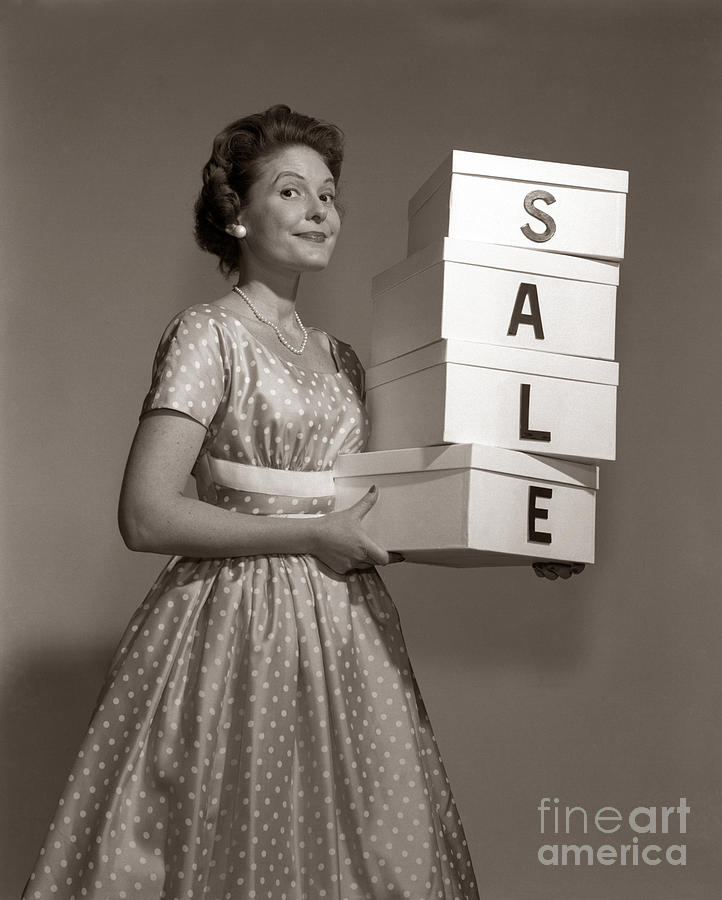 Woman With Boxes Reading Sale, C.1960s Photograph by Debrocke/ClassicStock