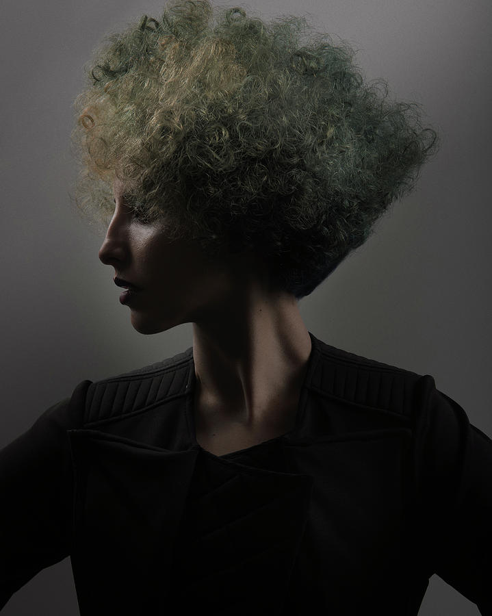Woman With Green And Blonde Hair Color In Big Hair Perm Photograph