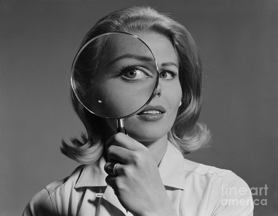 Woman With Magnifying Glass, C.1960s Photograph by H. Armstrong Roberts/ClassicStock