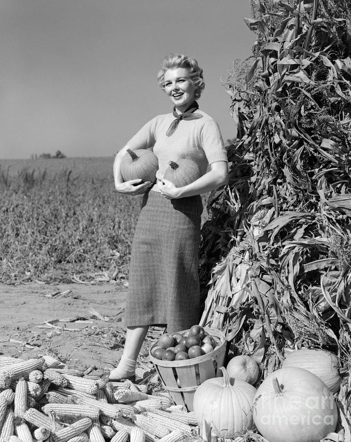 Woman With Pumpkins, C.1950-60s Photograph by H. Armstrong Roberts/ClassicStock