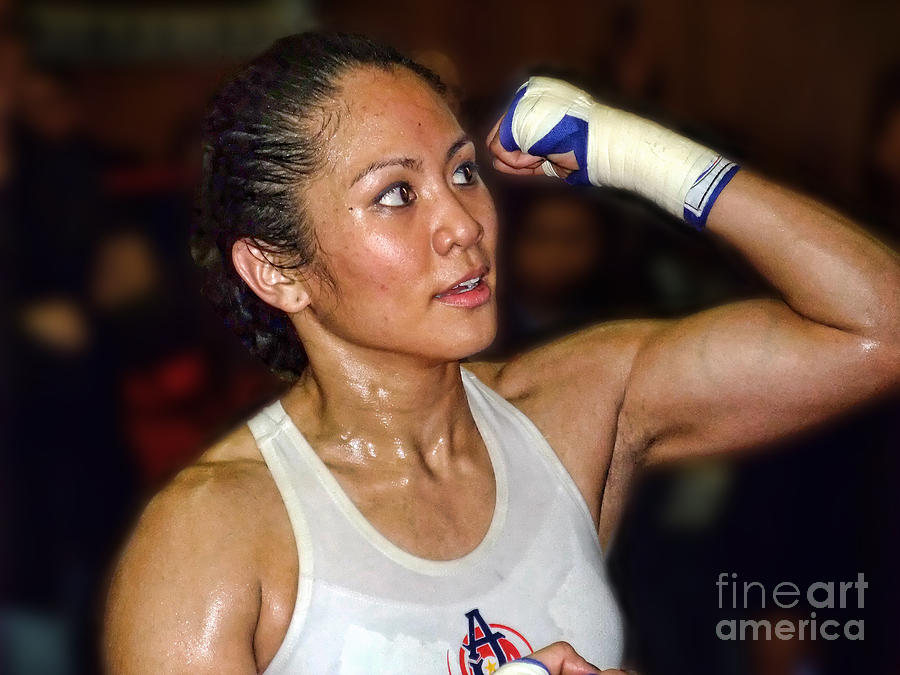 Portrait Photograph - Womans Boxing Champion Filipino American Ana Julaton on the Speed Bag II by Jim Fitzpatrick