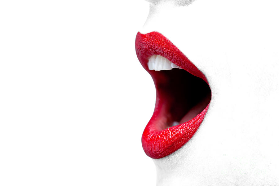 Womans Mouth Wide Open With Red Lipstick. Photograph