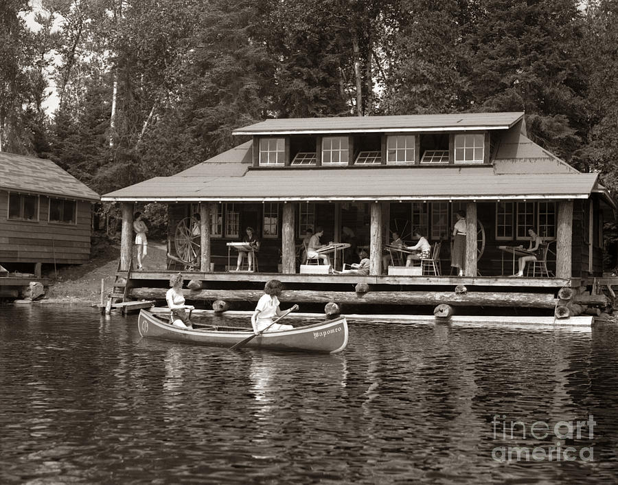 Women Canoe Past A Cabin, C.1950s Photograph by H. Armstrong Roberts/ClassicStock