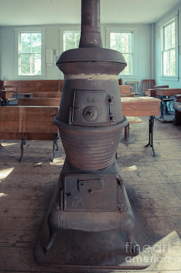 Wood stove in an old one room school house Photograph by Edward Fielding