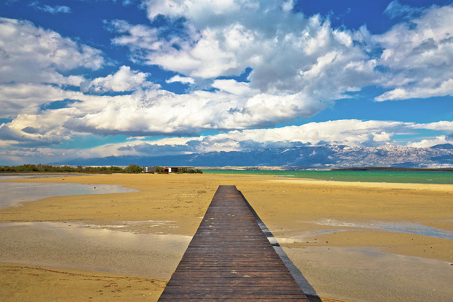 Wooden boardwalk and sand beach of Nin Photograph by Brch Photography