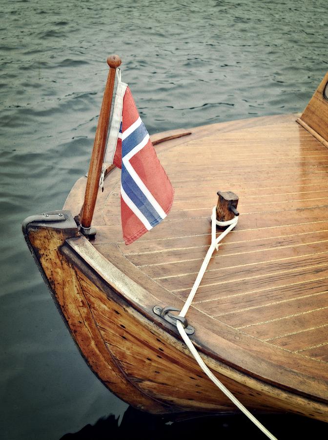 Wooden Boat with Norwegian Flag Photograph by Michelle Calkins