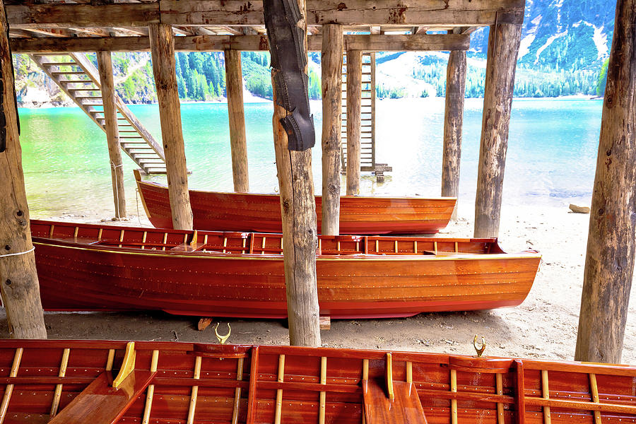 Wooden boats under boat house on Braies lake Photograph by Brch Photography