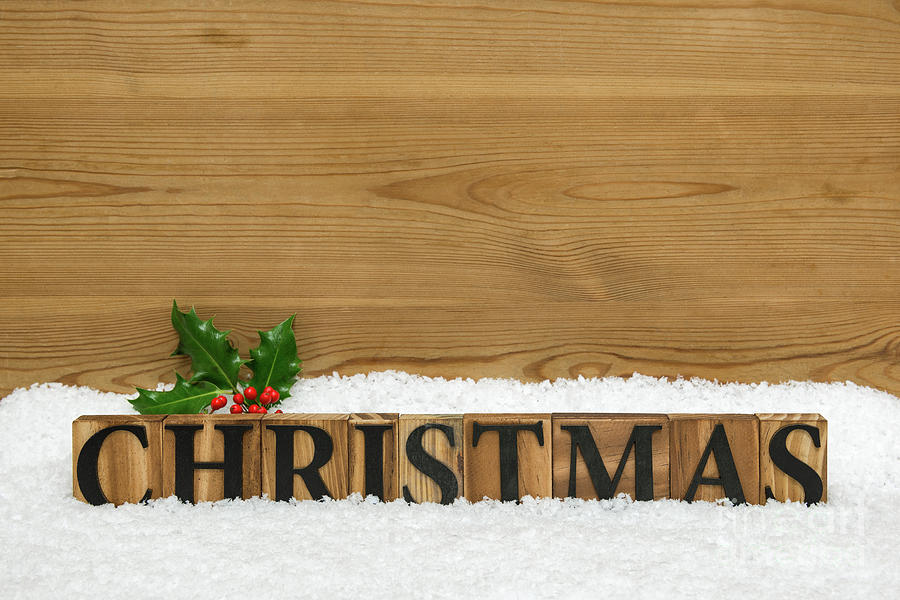 Wooden Christmas Word With Holly And Snow Photograph