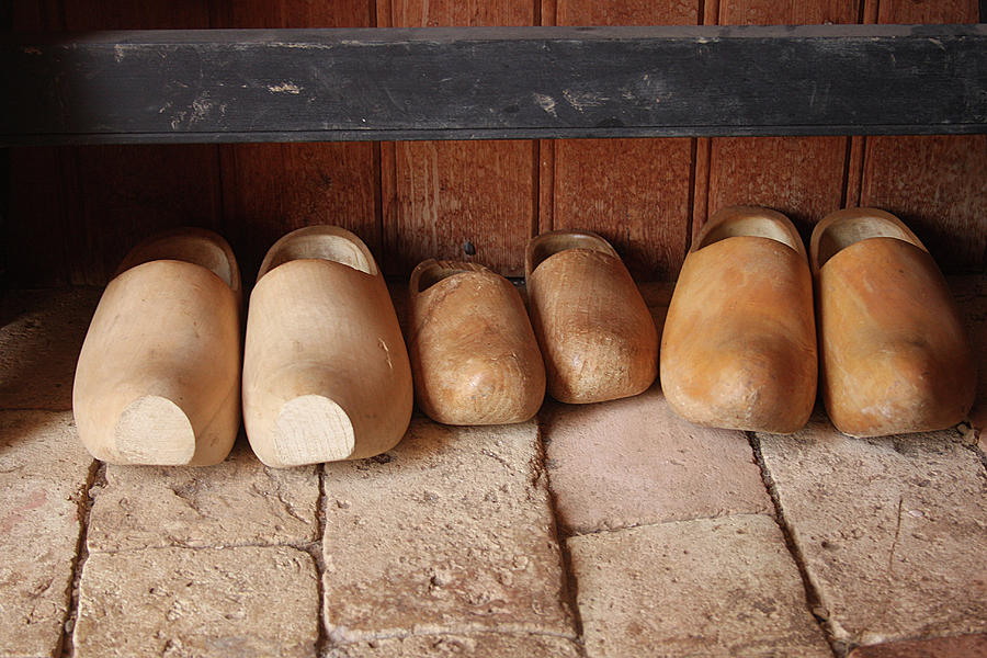 Wooden clogs Photograph by Emanuel Tanjala