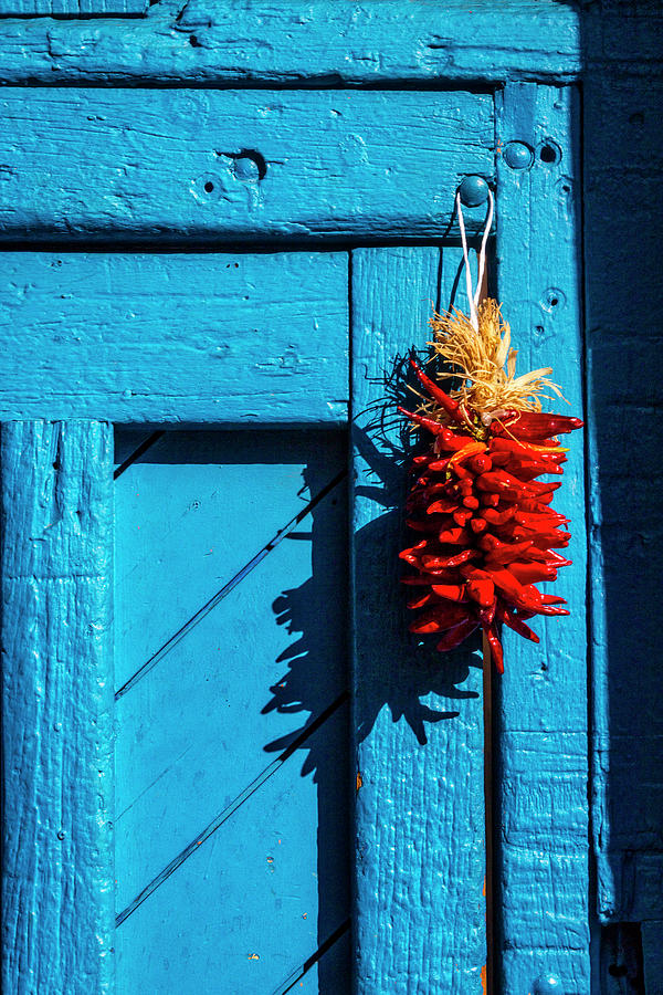 Architecture Photograph - Wooden Door With Chilis by Garry Gay