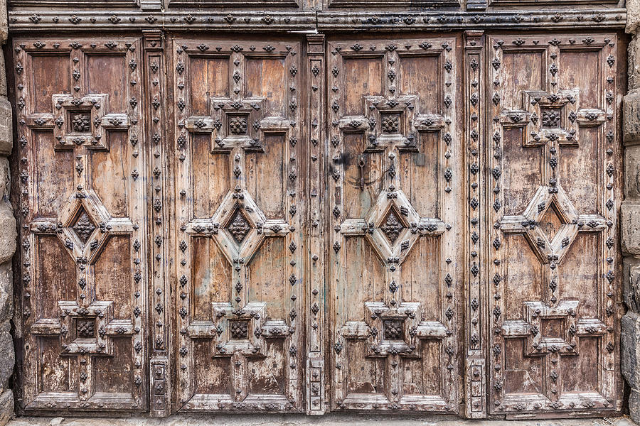 Architecture Photograph - Wooden doors with relief carved patterns by Semmick Photo